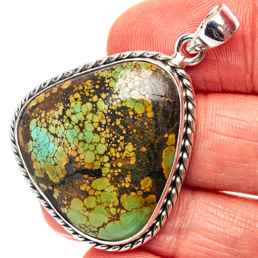 Sterling silver pendant with teardrop turquoise mosaic stone and loop bail.
