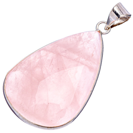 Rose quartz teardrop pendant with silver-tone bail and pink stone