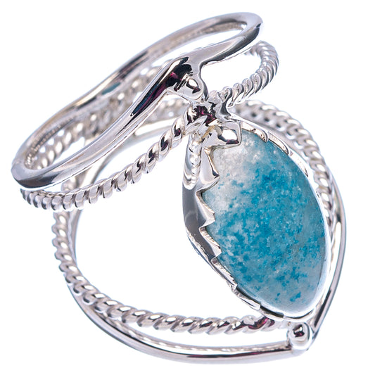 Sterling silver trolleite ring with ornate frame and oval blue stone, rope shank