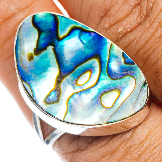 Oval abalone inlay sterling silver ring, vibrant blue-green iridescence on size 9