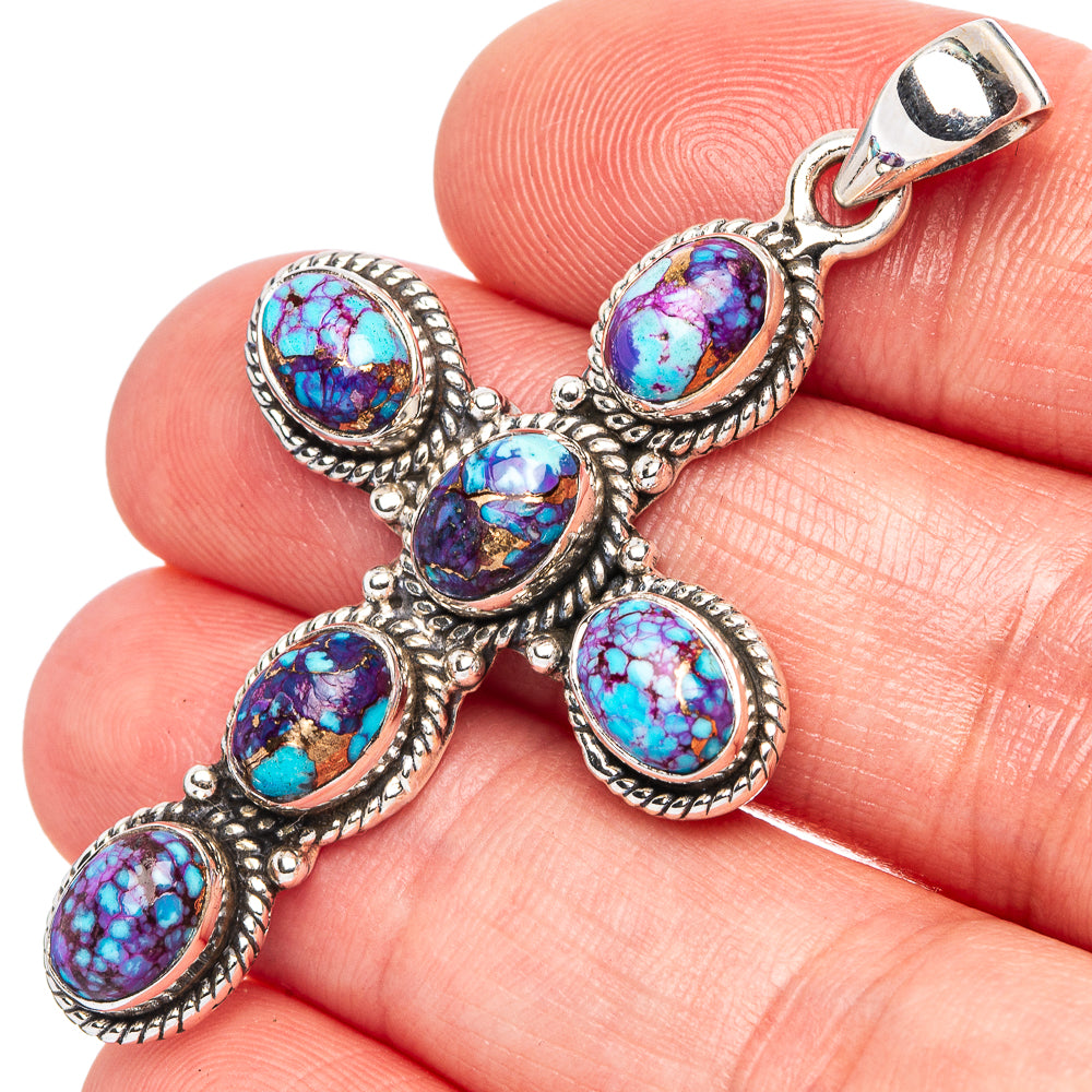 Turquoise spiny oyster cross pendant with oval bezel stones and silver bail