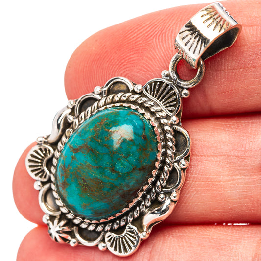 Turquoise pendant in .925 sterling silver, oval cabochon with ornate scalloped bezel