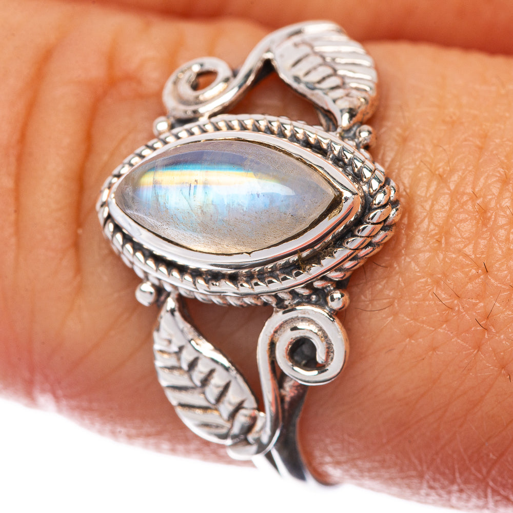 925 sterling silver moonstone dainty ring with oval rainbow cabochon, ornate braided design