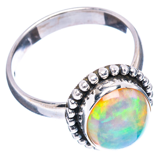 Ethiopian opal stacking ring in .925 sterling silver, round cabochon with bead edge