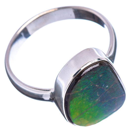 Sterling silver ammolite ring featuring a large green iridescent oval-teardrop stone