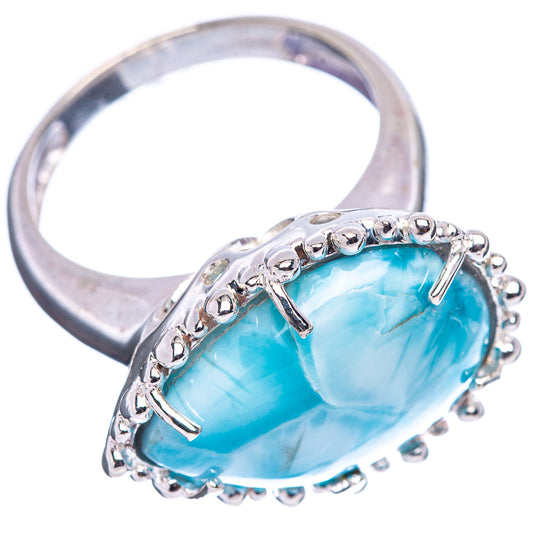 Sterling silver Larimar ring, side view, oval blue gemstone in prong halo