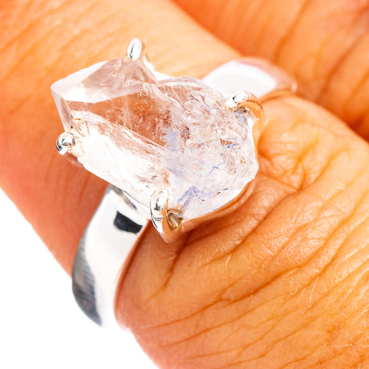 Faceted Dumortierite quartz ring with sterling silver prong setting, on hand