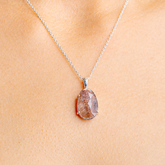 Sterling silver chain necklace with oval orange-brown cacoxenite pendant