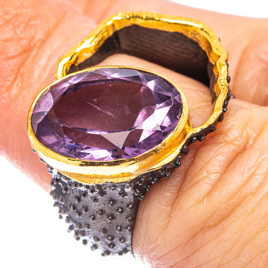 Amethyst black rhodium plated ring with oval purple gemstone and textured black band