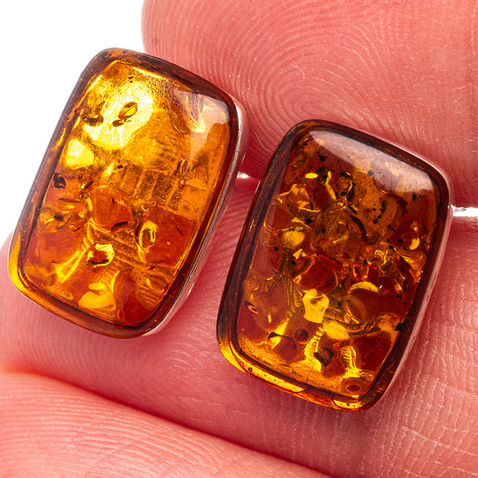 Square amber stud earrings with dark honey Baltic amber in silver bezel settings