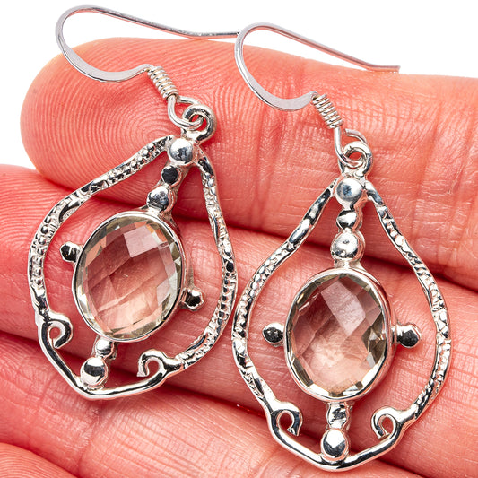 Sterling silver drop earrings with faceted gemstone teardrop filigree