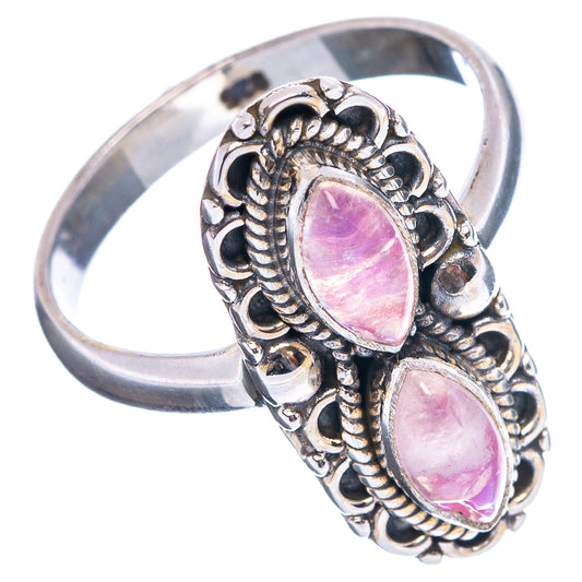 Sterling silver ring with two oval pink moonstone cabochons and ornate filigree bezel
