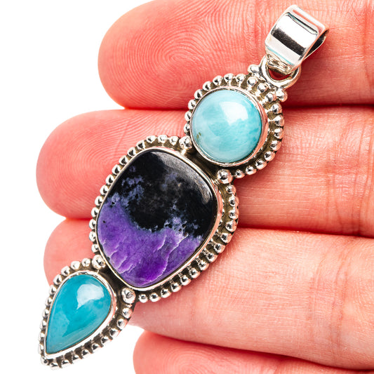 Sterling silver triple gemstone pendant with oval purple and turquoise stones, beaded bezel