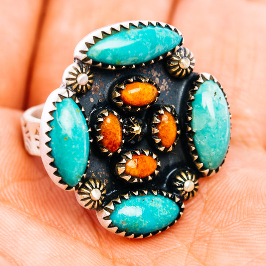 Turquoise and orange coral stone ring with dark silver scalloped setting and round studs