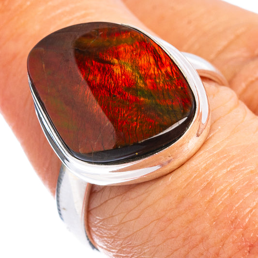 Sterling silver ring with oval iridescent ammolite stone, red-green-blue flash