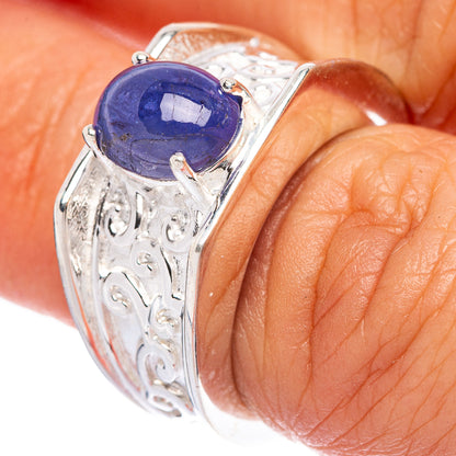 Sterling silver ring with oval blue tanzanite gemstone and ornate filigree setting