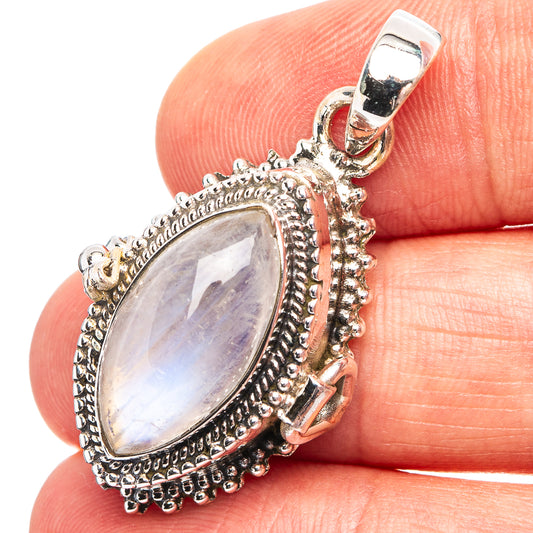 925 sterling silver rainbow moonstone poison pendant with ornate oval bezel and top bail