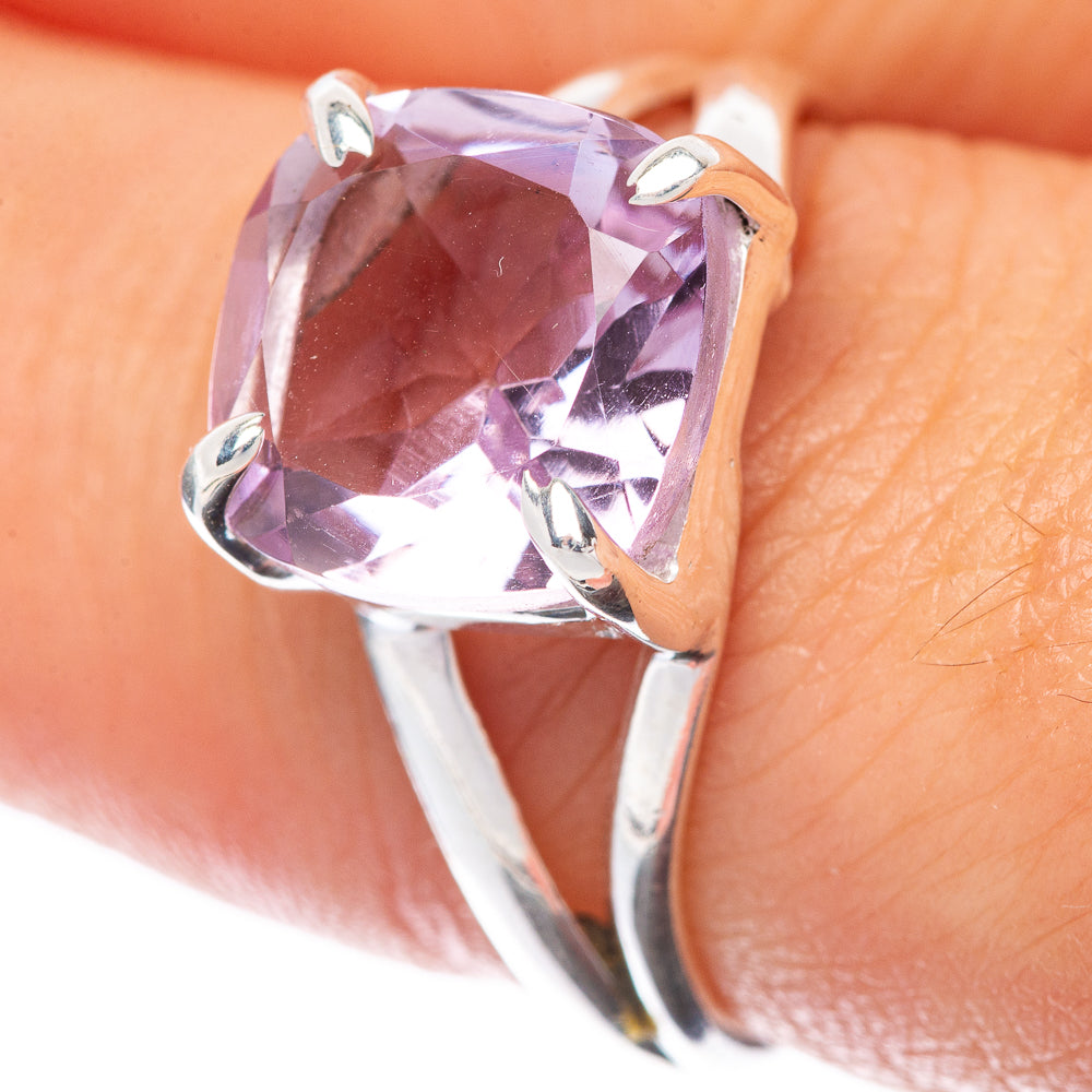 Sterling silver ring with large faceted pink amethyst cushion-cut, worn on finger