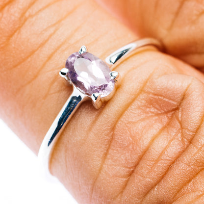 Amethyst stackable sterling silver ring with oval purple gemstone and four-prong setting