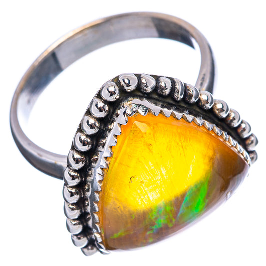 Ethiopian opal ring, teardrop opal with bright orange and green flashes, .925 silver band