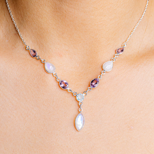 Sterling silver necklace with oval opal-like and amethyst blue gemstones, Y-link design