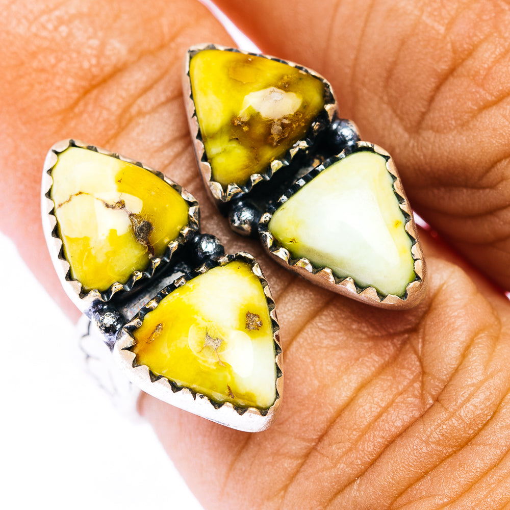 Southwestern silver ring with three yellow and cream marquise stones and beadwork