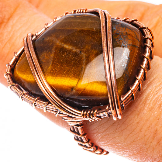 Oxidized copper wire-wrapped tiger's eye oval ring with dark brown bands