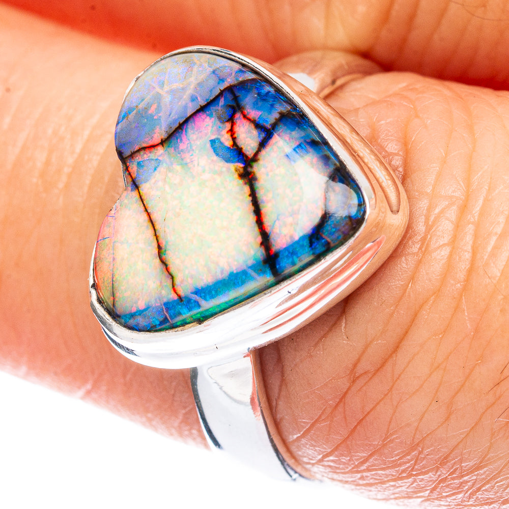 Heart-shaped opal ring with blue-and-white stone on 925 sterling silver band