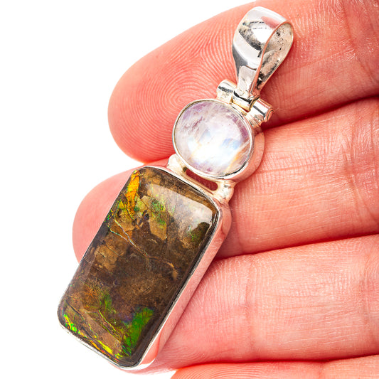 Sterling silver pendant with rectangular iridescent ammolite and oval moonstone cabochon