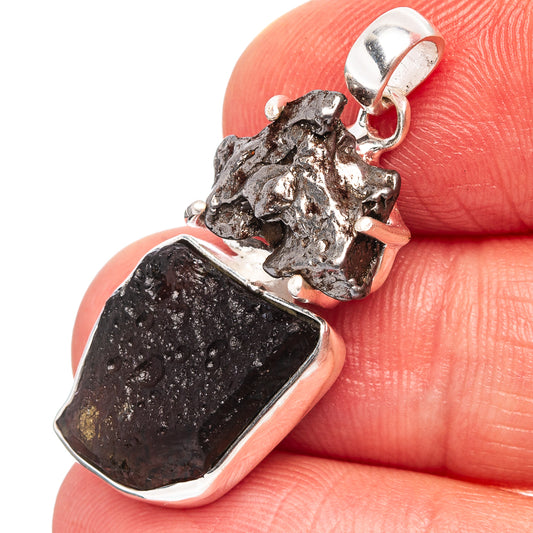 Sterling silver pendant with two rough dark stones and top loop bail