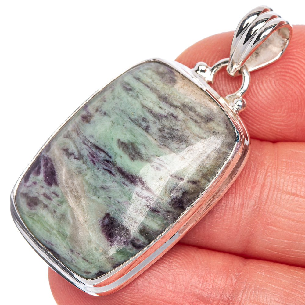 Sterling silver pendant with square-edged rectangular cabochon stone in green, purple, gray