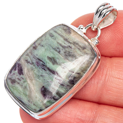 Sterling silver pendant with square-edged rectangular cabochon stone in green, purple, gray