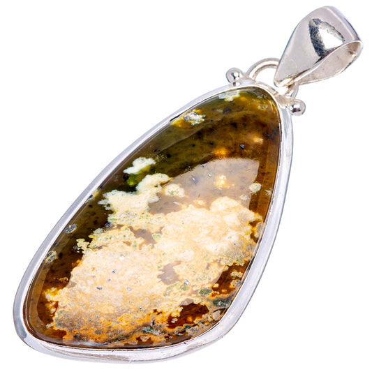 Sterling silver teardrop pendant with rhyolite cabochon and top bail in amber green