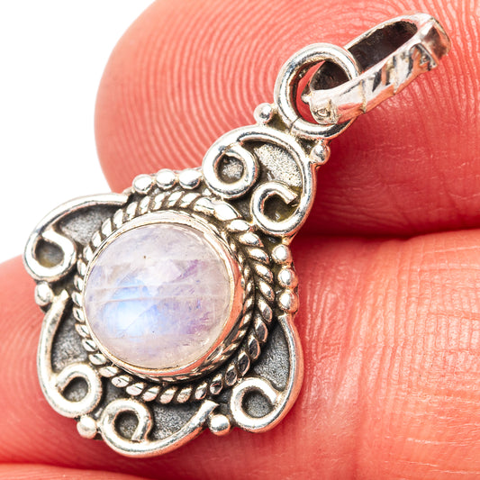 Sterling silver pendant with round rainbow moonstone center and ornate beaded halo