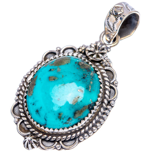 Sterling silver Kingman turquoise pendant, oval cabochon with detailed scalloped frame