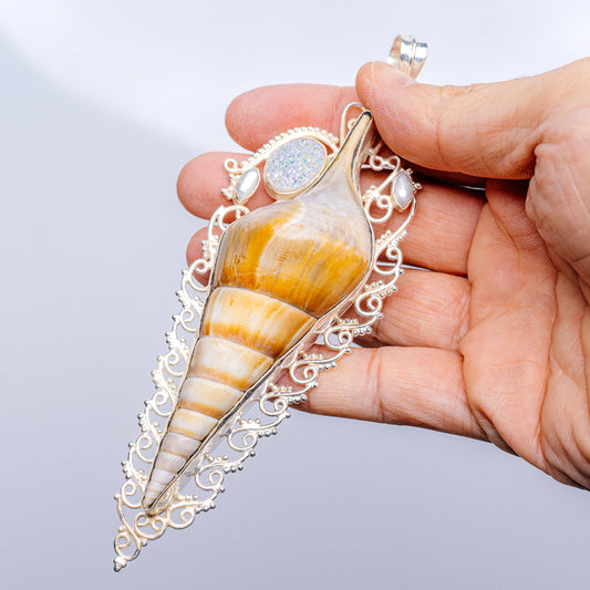 Silver conch shell pendant with blue druzy cabochon and ornate filigree, large teardrop