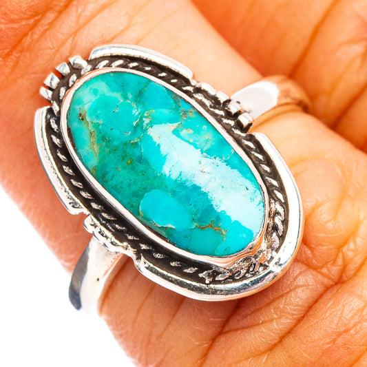 Oval turquoise stone sterling silver ring with ornate black trim