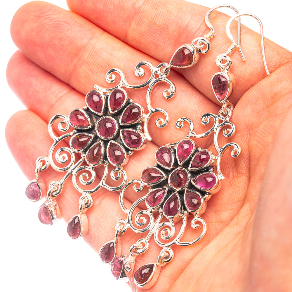 Sterling silver chandelier earrings with dark pink marquise stones, filigree drops, hook backs