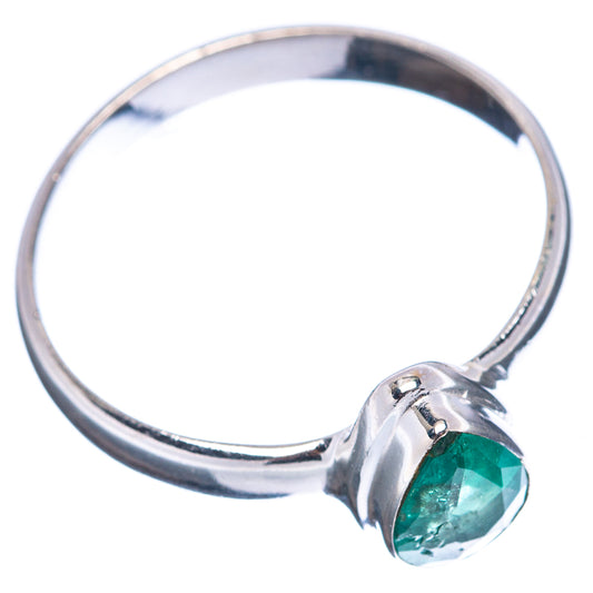 Sterling silver emerald ring with rounded band and raised pear-shaped green gemstone