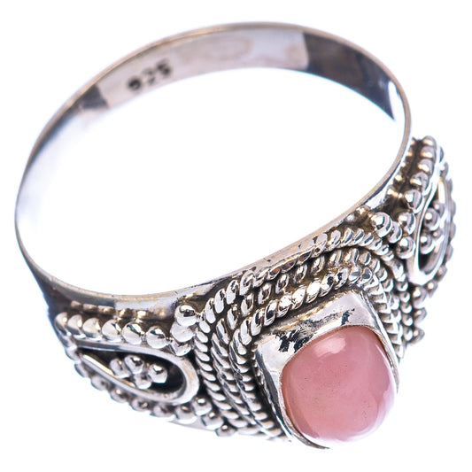 Pink opal ring, .925 sterling silver band with oval pink cabochon and detailed ropework sides
