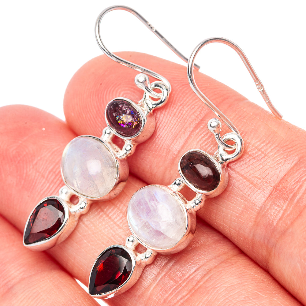 Sterling silver dangle earrings with moonstone rounds and garnet teardrops