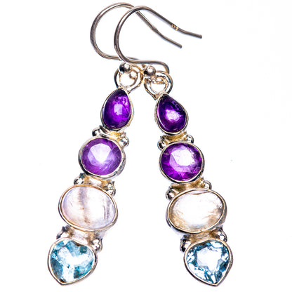 Sterling silver drop earrings featuring purple amethyst, pale moonstone, and light blue topaz