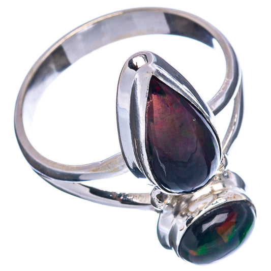 Oval black opal ring in .925 sterling silver, size 10, polished band with two cabochons