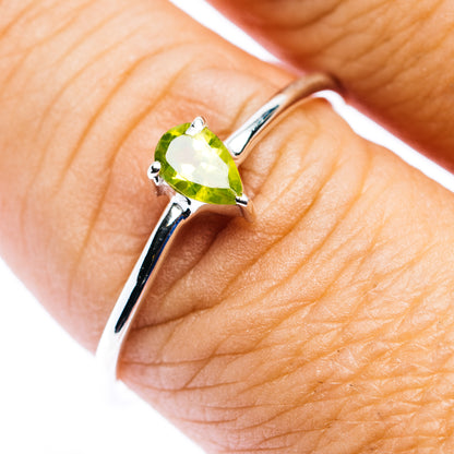 Sterling silver stackable ring with pear-shaped green peridot gemstone