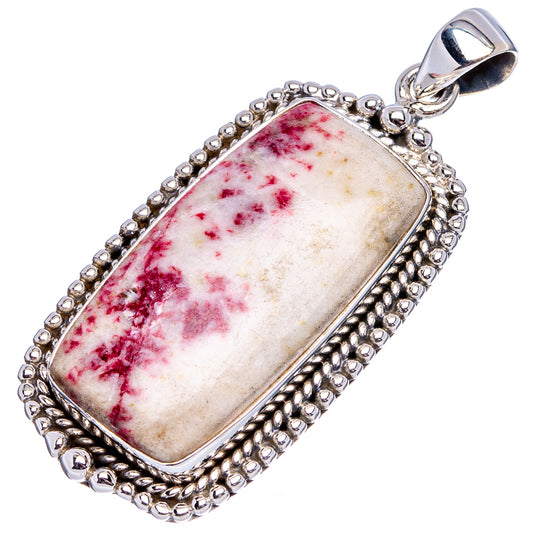 Rectangular .925 sterling silver pendant with red-and-white stone, decorative bead bezel