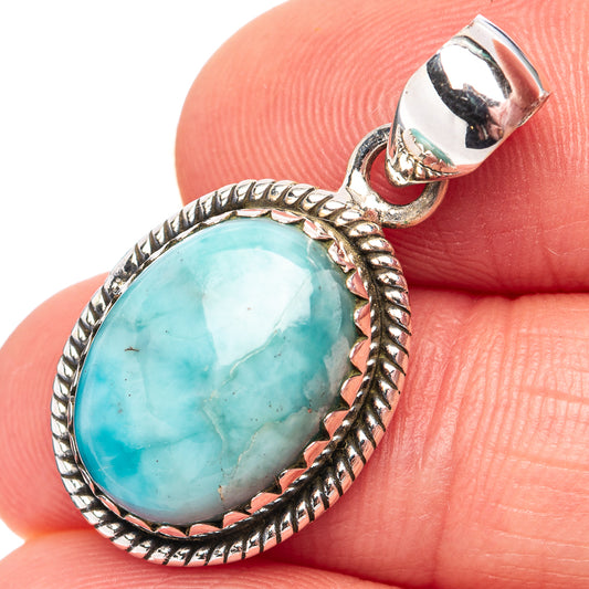 Sterling silver larimar pendant with oval turquoise stone and rope-edged bezel