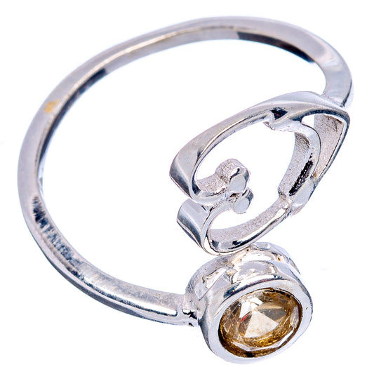 Sterling silver heart ring with round citrine center stone and curled side prongs