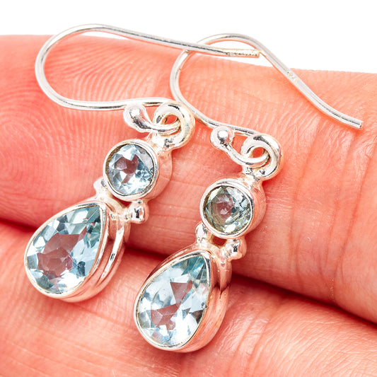 Sterling silver blue topaz drop earrings with pear and round light-blue stones