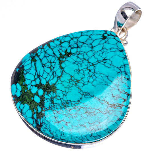 Turquoise teardrop pendant with silver bail and polished stone cabochon