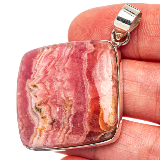 Rhodochrosite pendant in silver bezel with loop bail, pink and cream stone